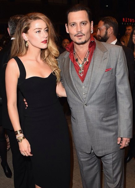 Джонни Депп, Эмбер Херд и Дакота Джонсон на премьере фильма "Черная месса